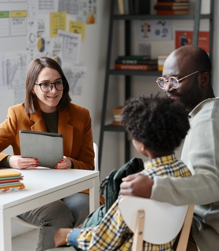 Teacher,Having,Meeting,With,Parent,Of,Schoolboy